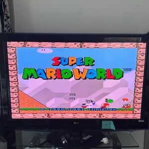 Nintendo Super Mario World on Black LG Screen